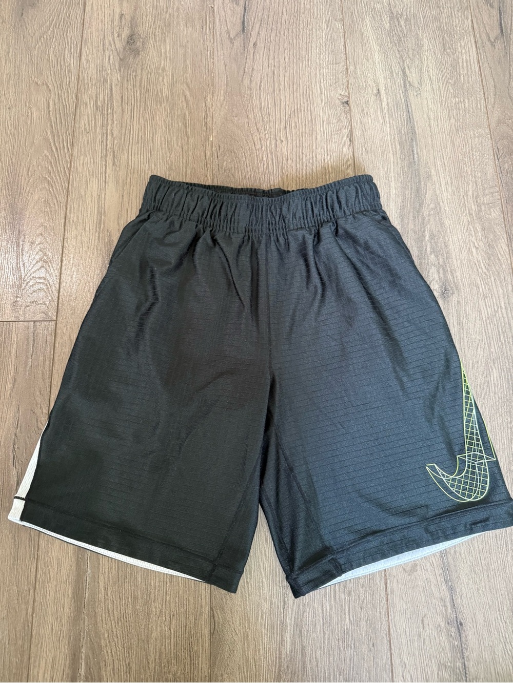 Nike Black Shorts with yellow/green Swoosh